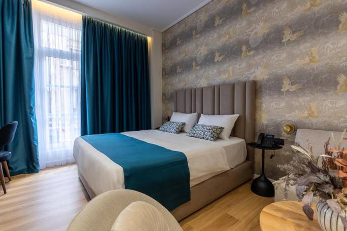 Example boutique hotel room in Tirana; or similar
