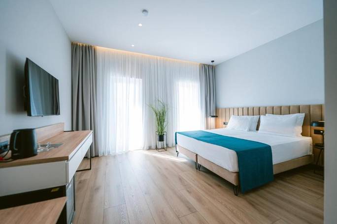 Example boutique hotel room in Shkodra; or similar