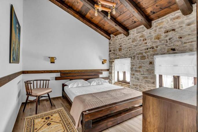 Example boutique hotel room in Berat; or similar
