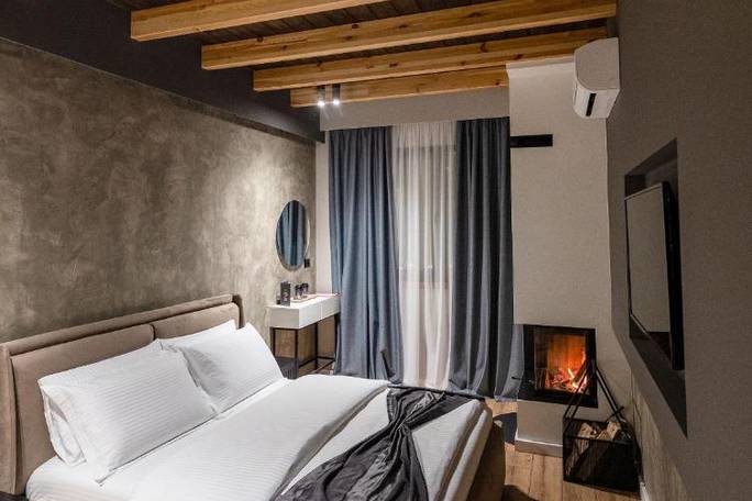 Example boutique hotel room in Korca; or similar
