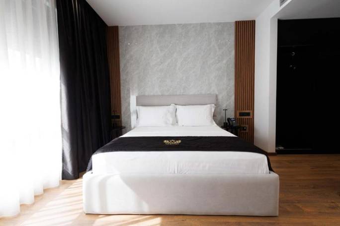 Tirana boutique hotel room — planned accommodation or similar