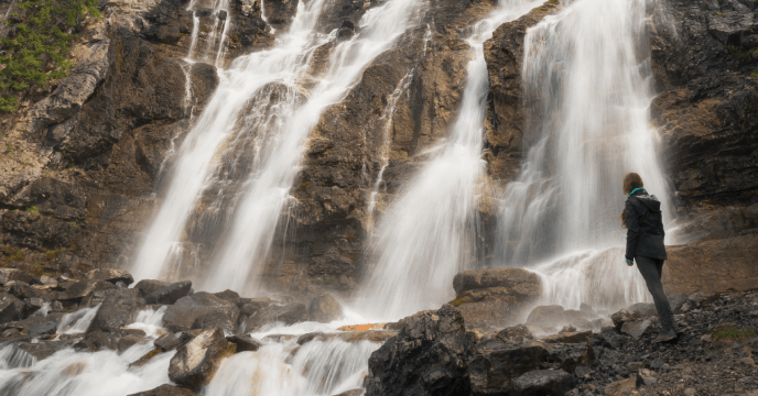 woman overlooking waterfall in Jasper National Park