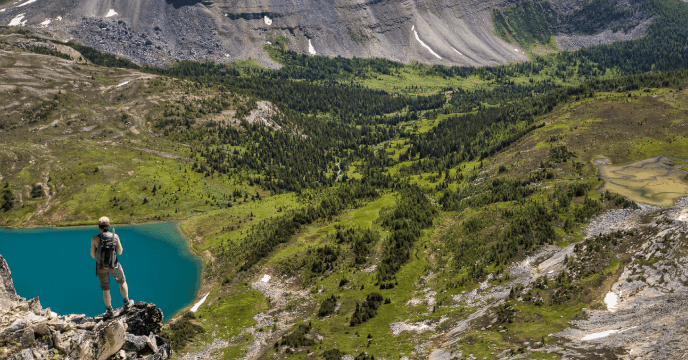 traveller admiring the view of the Canadian Rockies