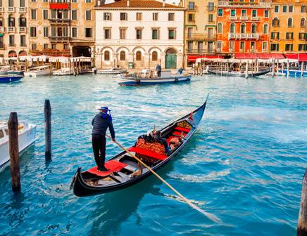 A gondola gliding through the canals of Venice