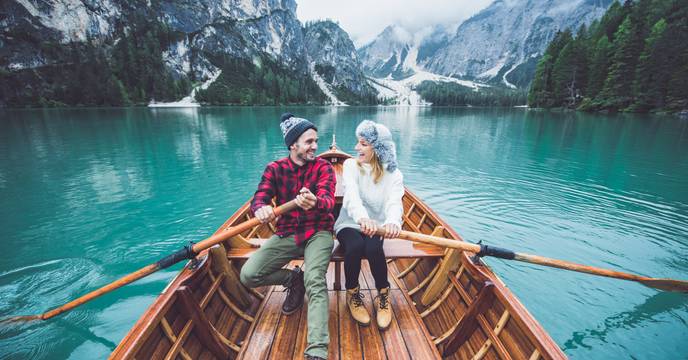 Canoe on sapphire-blue waters in Alaska