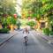 Woman cycling in Hanoi