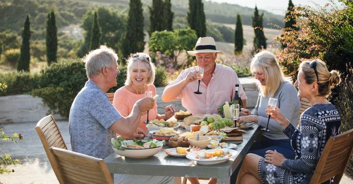 Seniors enjoying food and drink