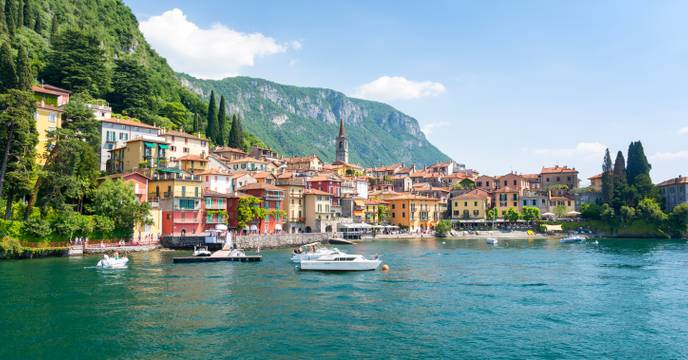 Seaside down with mountains in the background, Italy