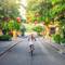 Woman cycling in Hanoi