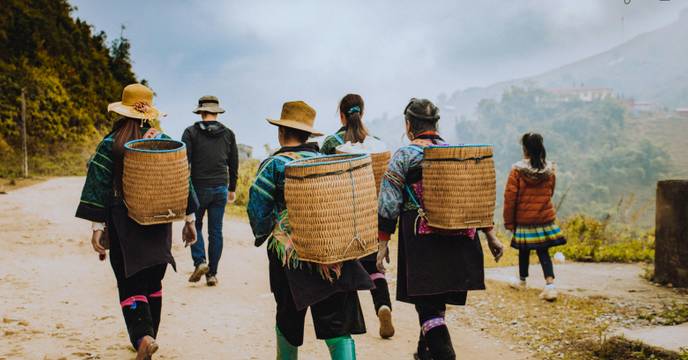 People walking in a misty morning