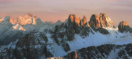 The evening glow against rugged mountain peaks