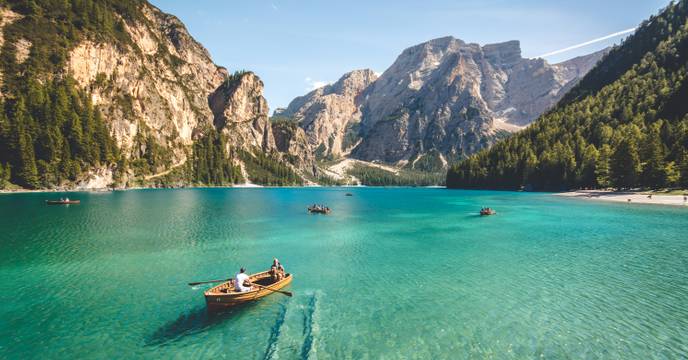 Boats gliding on a mountain lake