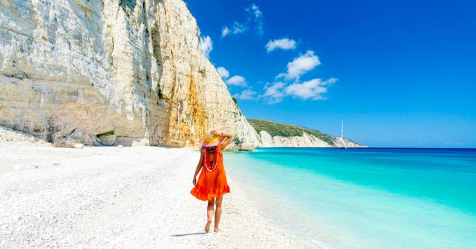 Woman walking on a beach