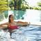Woman unwinding in pool