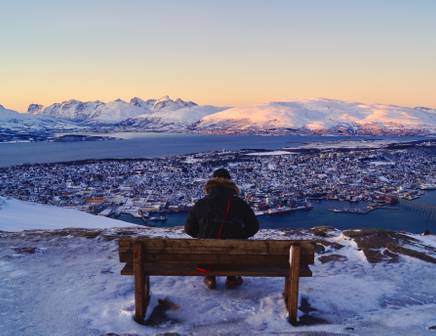 girl gazing at cold view of the north pole