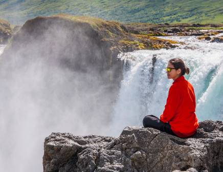 girl exploring waterfalls