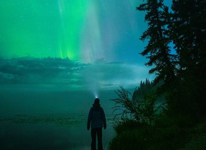 Person on northern lights tour in Alaska