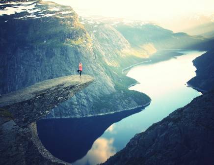 person overseeing a river