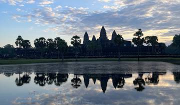 Reflection of a temple and sky in the water.