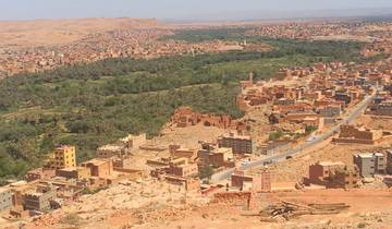 Panoramic view of a Moroccan town with surrounding greenery.