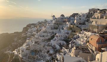 Sunset view over the iconic architecture of Santorini.
