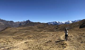 Expansive mountain view with a person