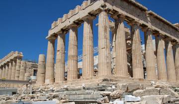 Ancient Greek temple with blue sky.