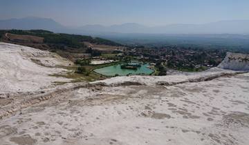 Landscape view with hills and a small village.