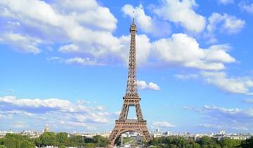 Clear view of the Eiffel Tower against a blue sky.