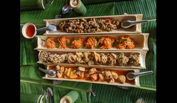 Traditional Thai food served in elongated bamboo trays.