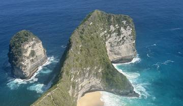 Cliffside view of the ocean and beach.