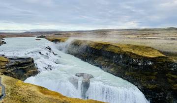 Powerful waterfall cascading through a rugged canyon.