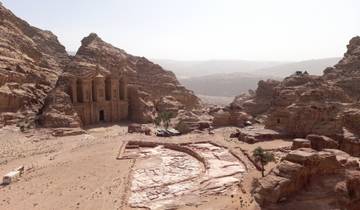 The Monastery at Petra with surrounding mountains.