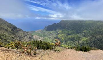 Scenic view of a canyon with the ocean in the background.