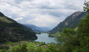 Scenic mountain landscape with a lake in the valley.