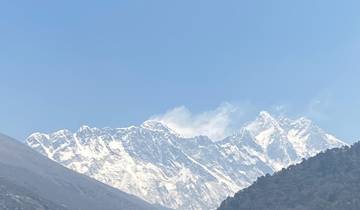 Snow-capped mountain range under a clear sky
