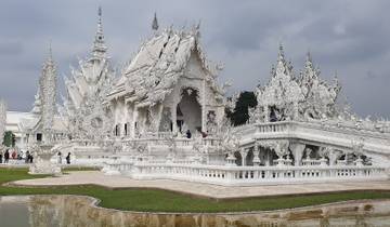 Stunning white temple with intricate architecture.
