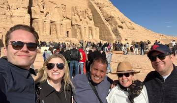 Tourists posing in front of the Abu Simbel temples.