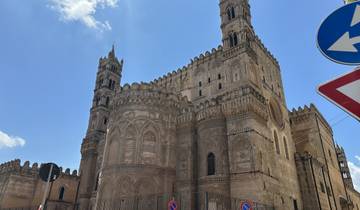 Stunning view of the Cattedrale di Palermo under a clear blue sky.