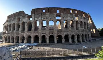 Full view of the Colosseum bathed in sunlight.