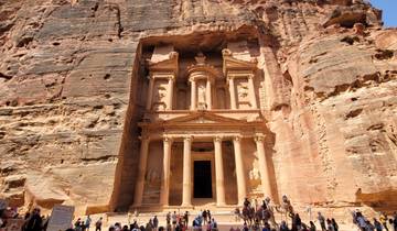The Treasury of Petra carved into the rock face in Jordan.