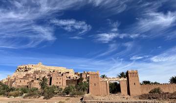 Historical fortress with traditional architecture against a blue sky.