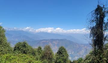Mountain range under a clear blue sky.