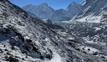 Rocky snow-covered pathway in mountains