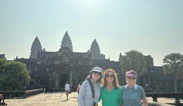 Group posing in front of the Angkor Wat temple complex.