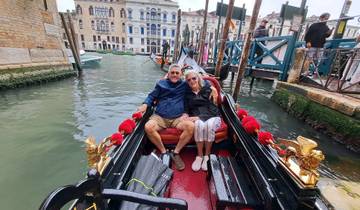 Couple enjoying a gondola ride in Venice