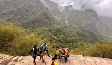 Group of hikers resting at a scenic point.