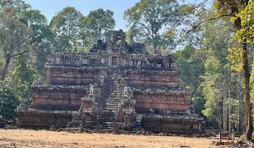 Ancient stone temple surrounded by trees
