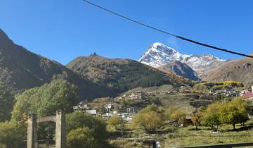 A scenic view of mountains with snowcaps.