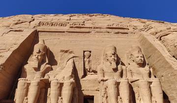 Facade of the Abu Simbel temple with giant statues.